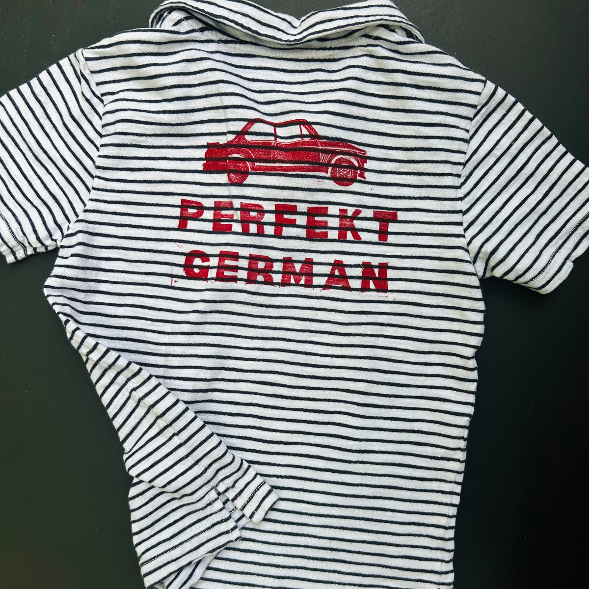 Child’s dark blue striped PERFEKT GERMAN 2002 short sleeve shirt